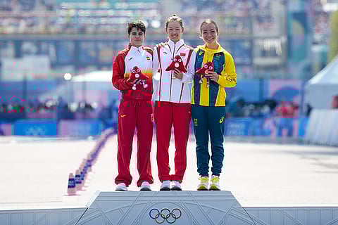 Gold medalist China's Yang Jiayu with Maria Perez, left, and Jemima Montag